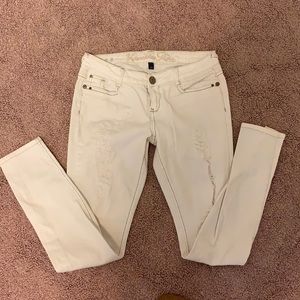 white ripped jeans. never worn